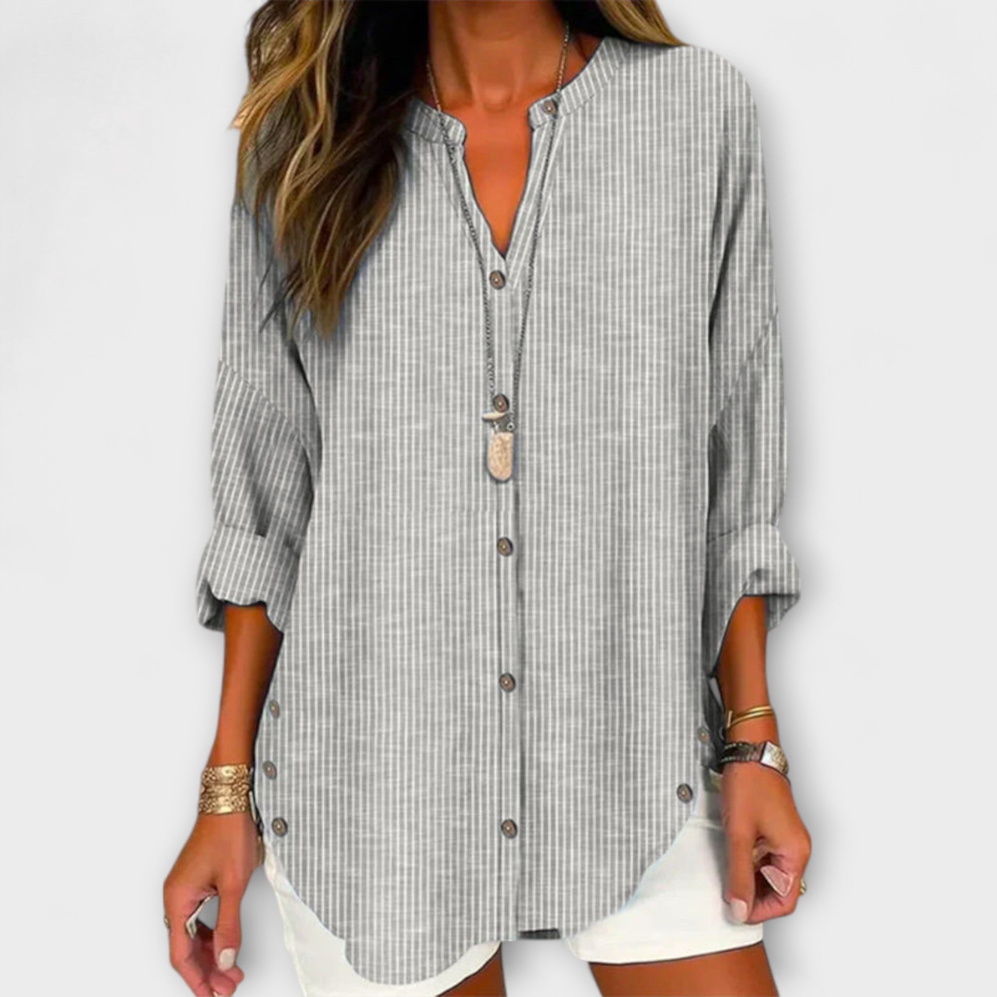 Lucida – Top con scollo a V, design elegante e classico a righe